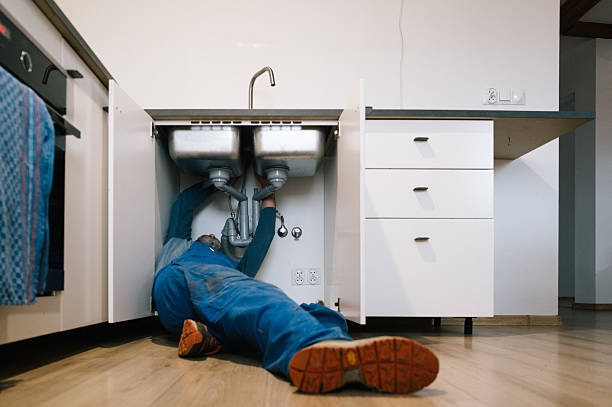Professional Drain Cleaning technician working in Latham, NY